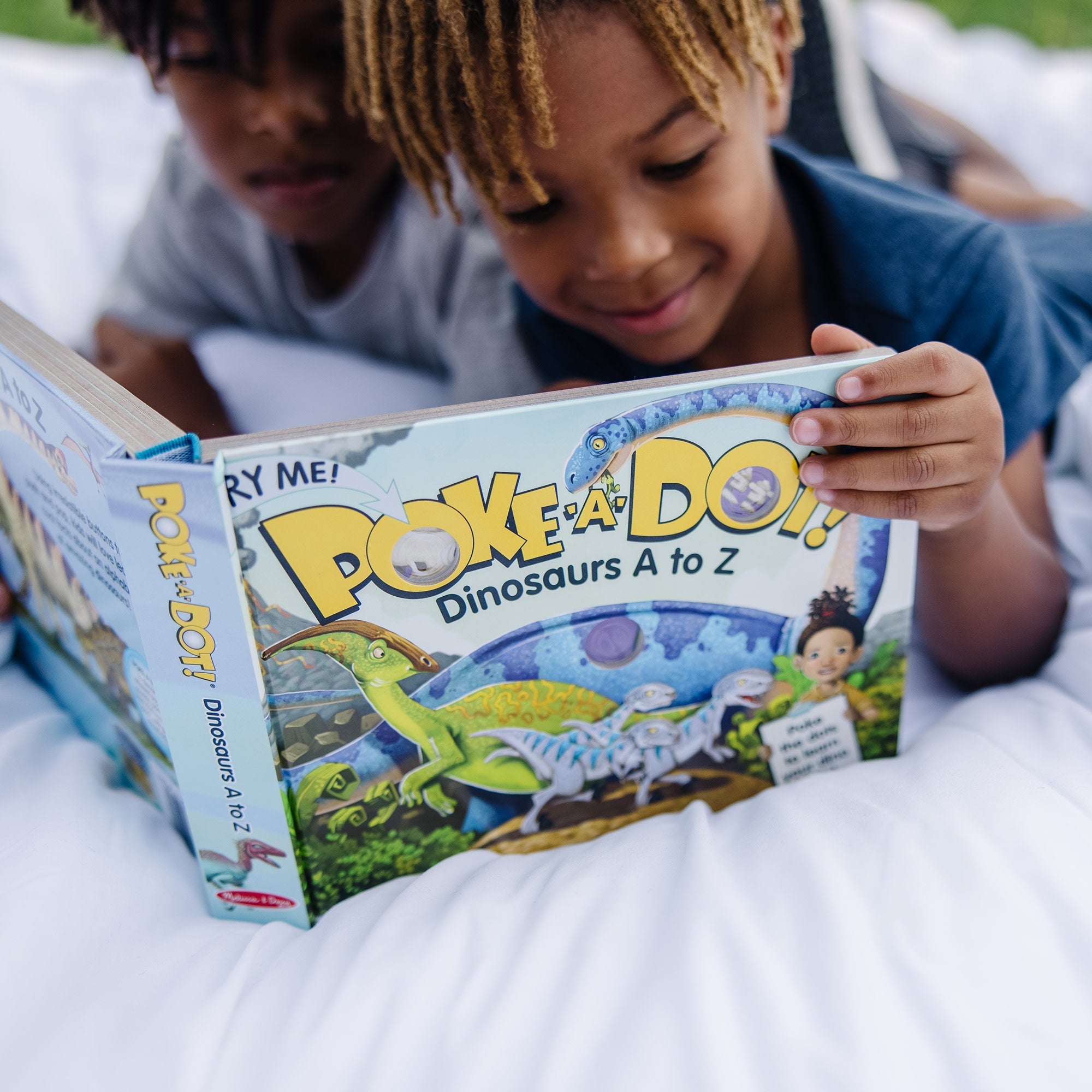 Poke-a-Dot: Dinosaurs A to Z Board Book