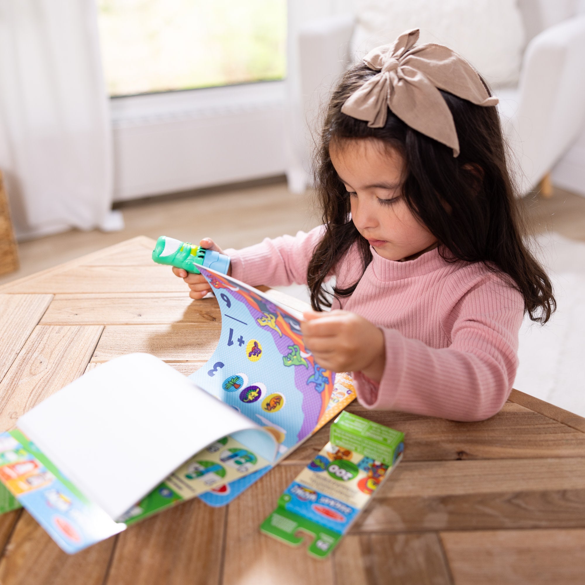 Sticker WOW!™ Dinosaur Bundle: Activity Pad & Sticker Stamper + Mini Activity Pad and 200 Refill Stickers